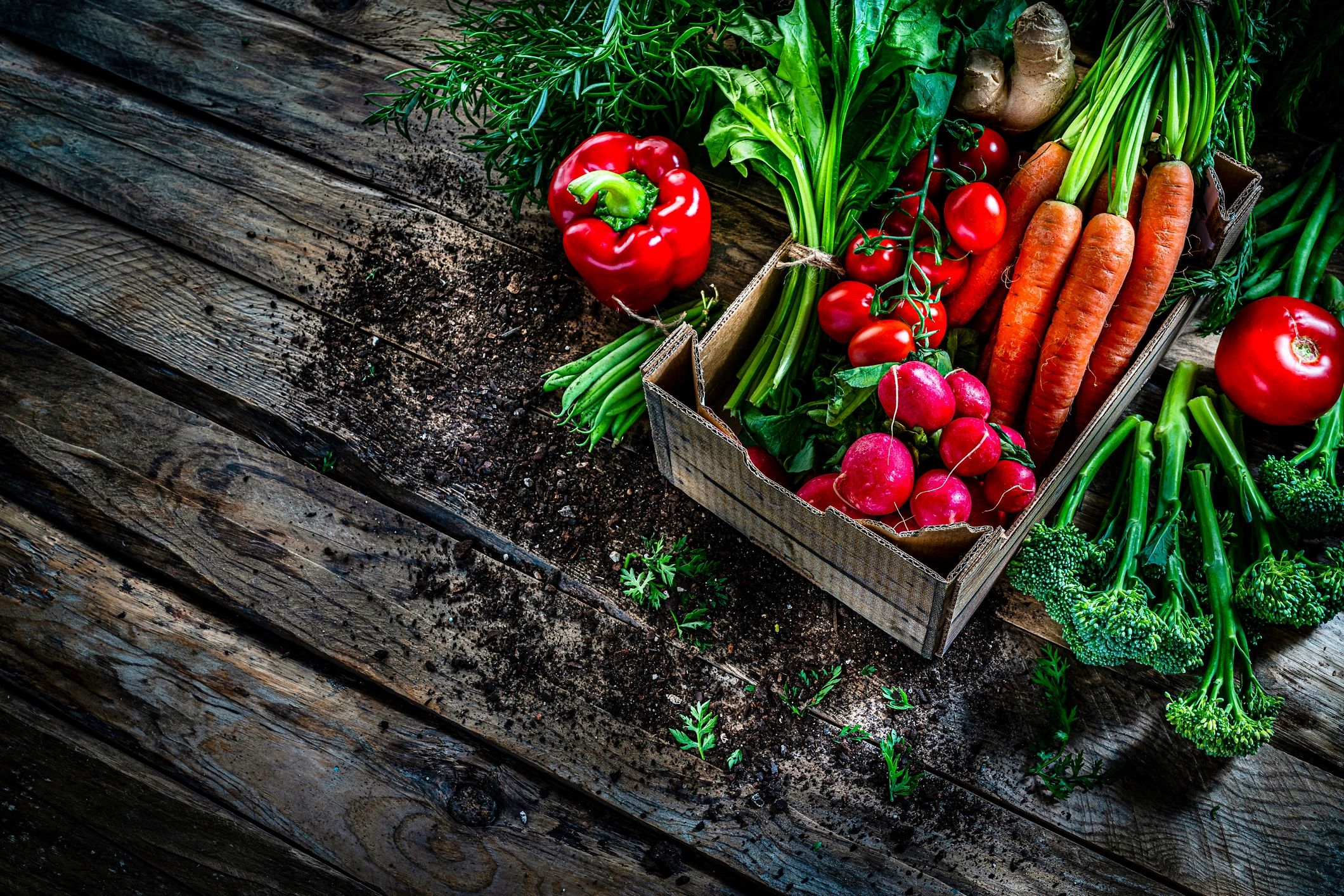 Fresh multicolored vegetables on a rustic table