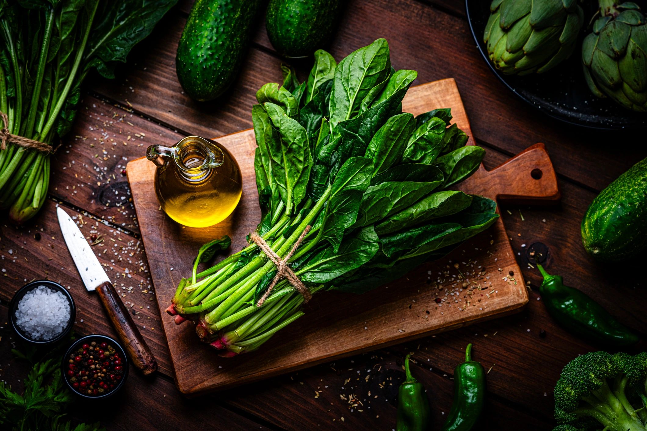 Fresh leafy greens on a wooden table