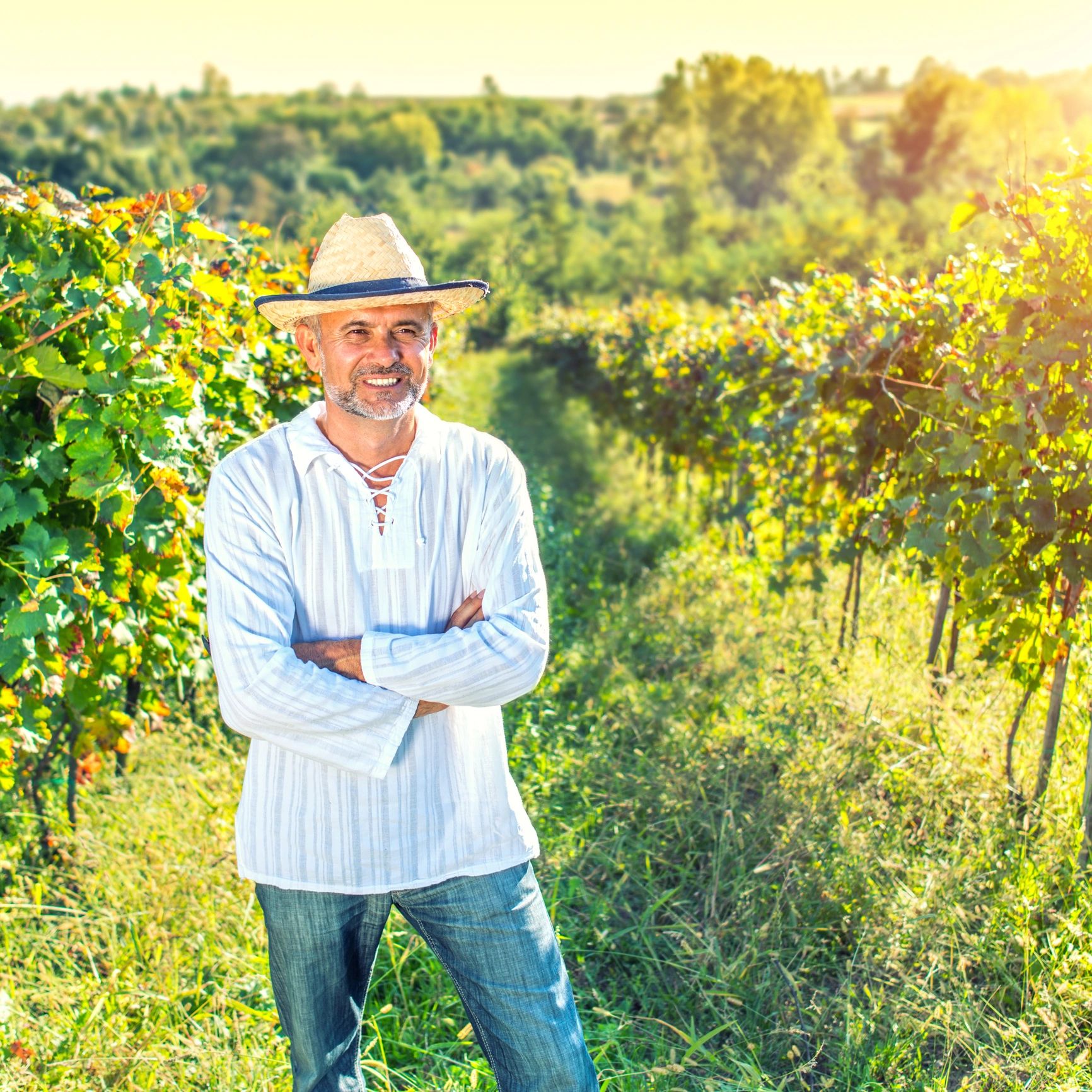 Portrait of a farm owner in a field